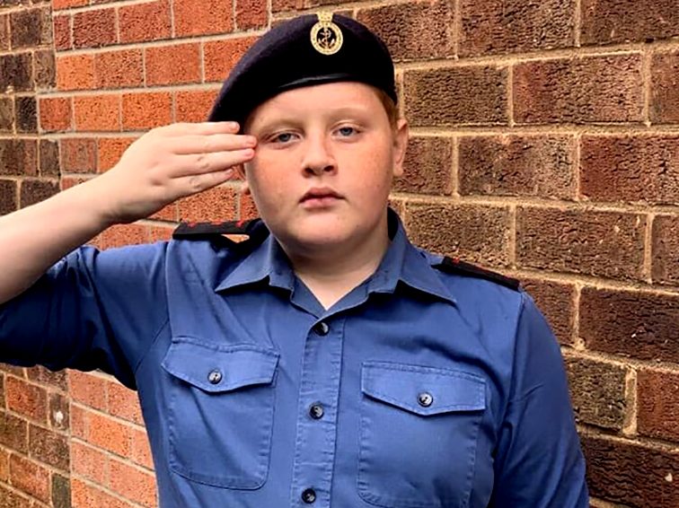 A Cadet salutes to mark VE day