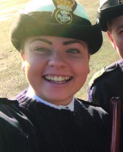 PO (SCC) Rebecca Hearn smiling at the camera in cadet uniform