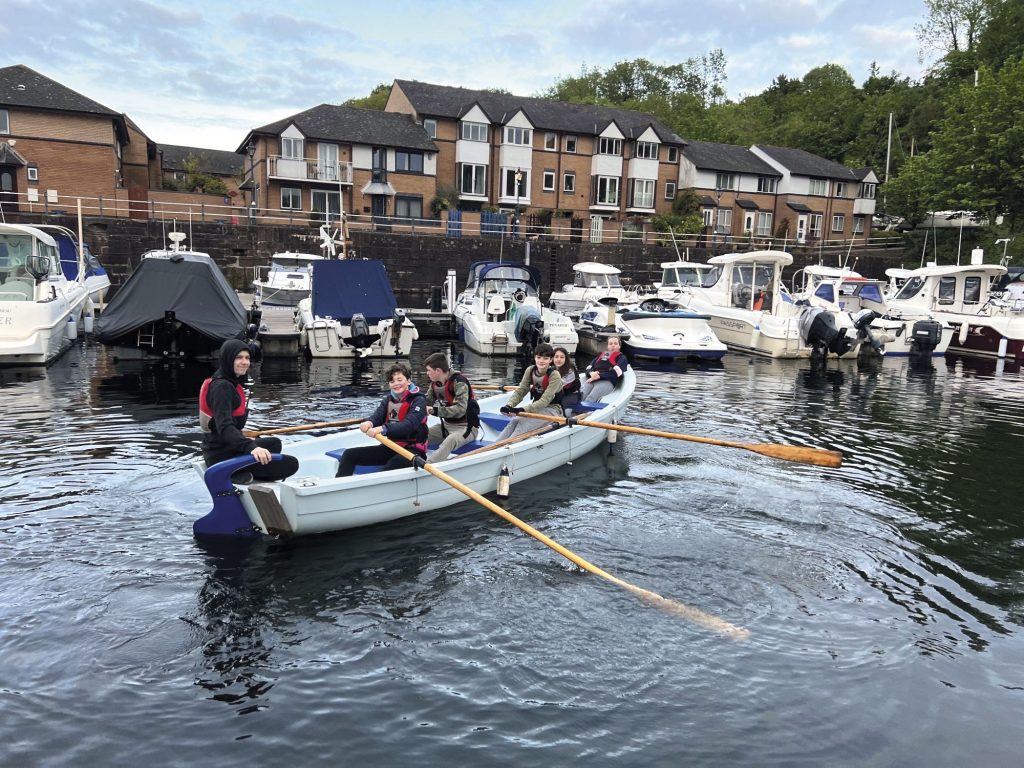 Cadets rowing in a harbour
