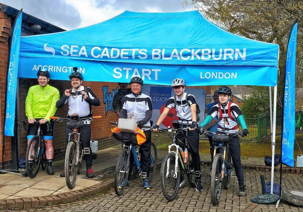 LC Hadley (second from right) and LC Felix (far right) at the starting line of a six-day bike ride