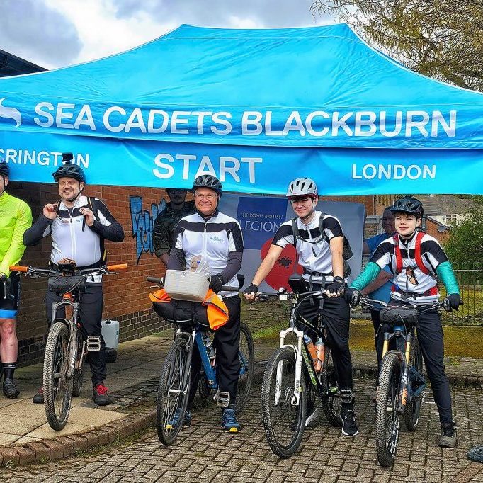 LC Hadley (second from right) and LC Felix (far right) at the starting line of a six-day bike ride