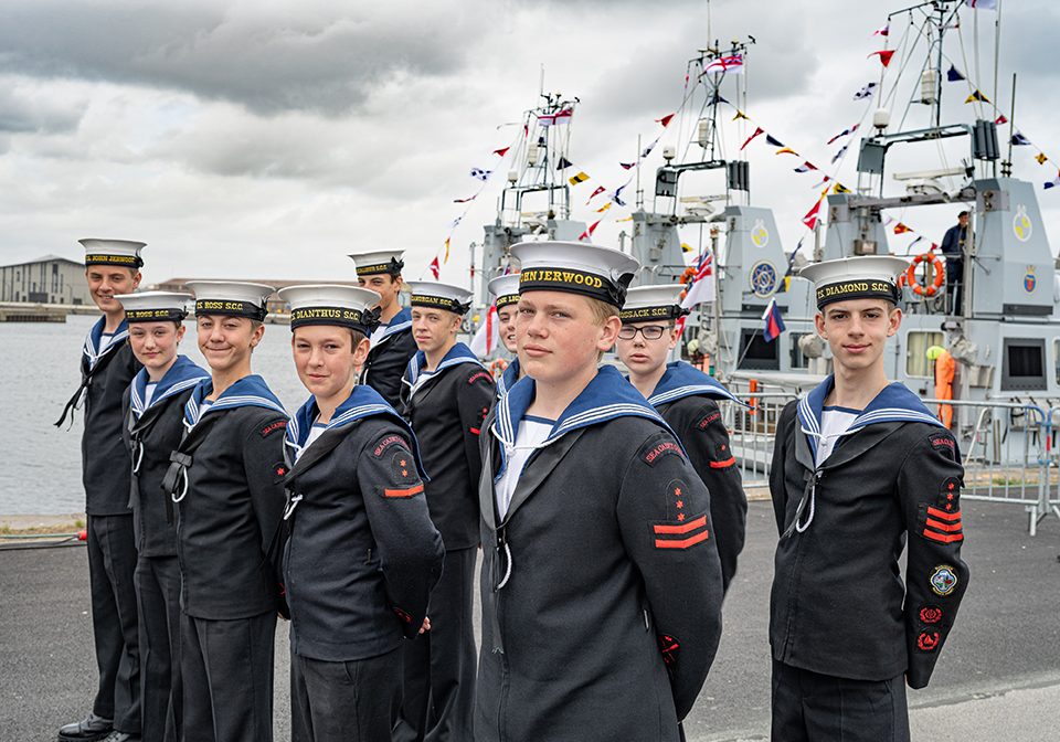 Dunkirk cadets with RN vessels 22 May 8860 Cadets learnt about Dunkirk and how it continues to hold a special place in our history