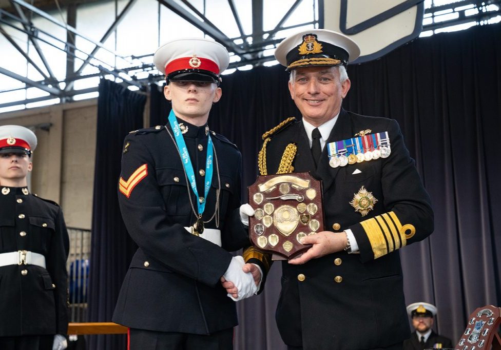 Receiving his 2025 trophy from Admiral Phil Jones Receiving his 2025 trophy from Sea Cadets President, Admiral Sir Philip Jones GCB DL