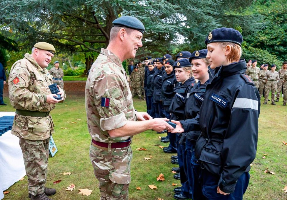 Rickmansworth Unit being presented with their Elworthy Trophy medals