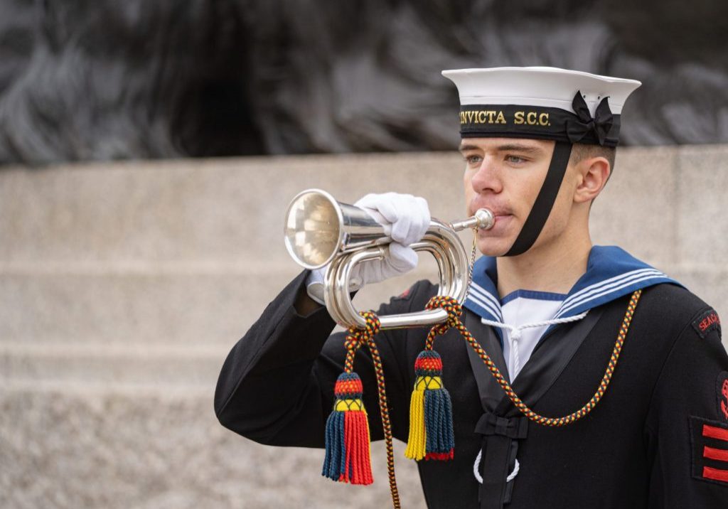 A Cadet at the Trafalgar Day Parade 2020 blowing his bugle